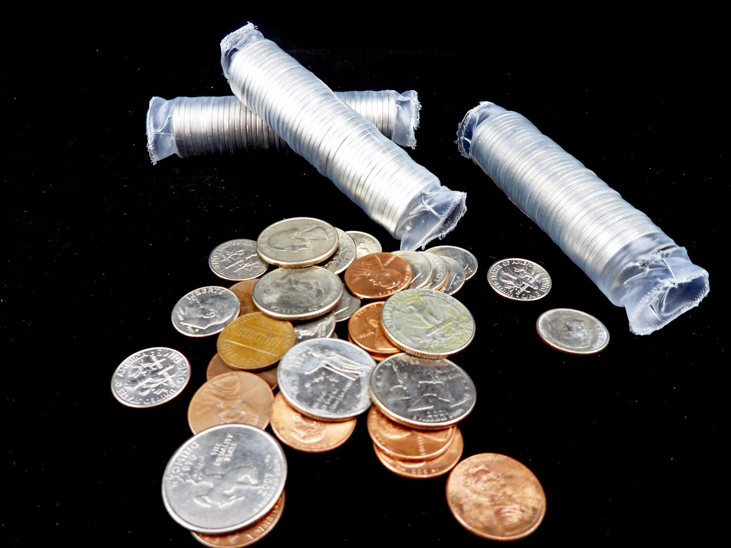 Tubes of coins partially unwrapped | OrnamentShop.com