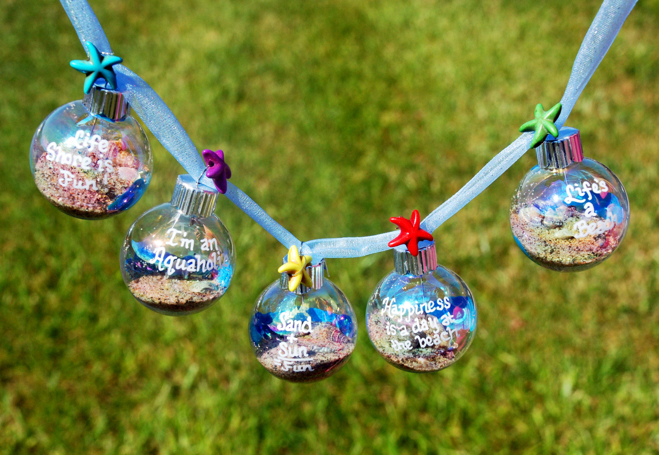 Christmas in July garland made of baubles with beach themes. | OrnamentShop.com 