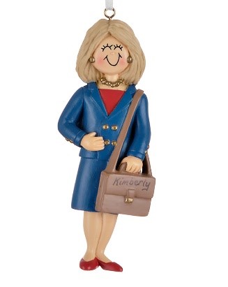A blonde female ornament wearing a business-like navy blue dress, gold jewelry and accents, and holding a brown messenger bag | OrnamentShop 