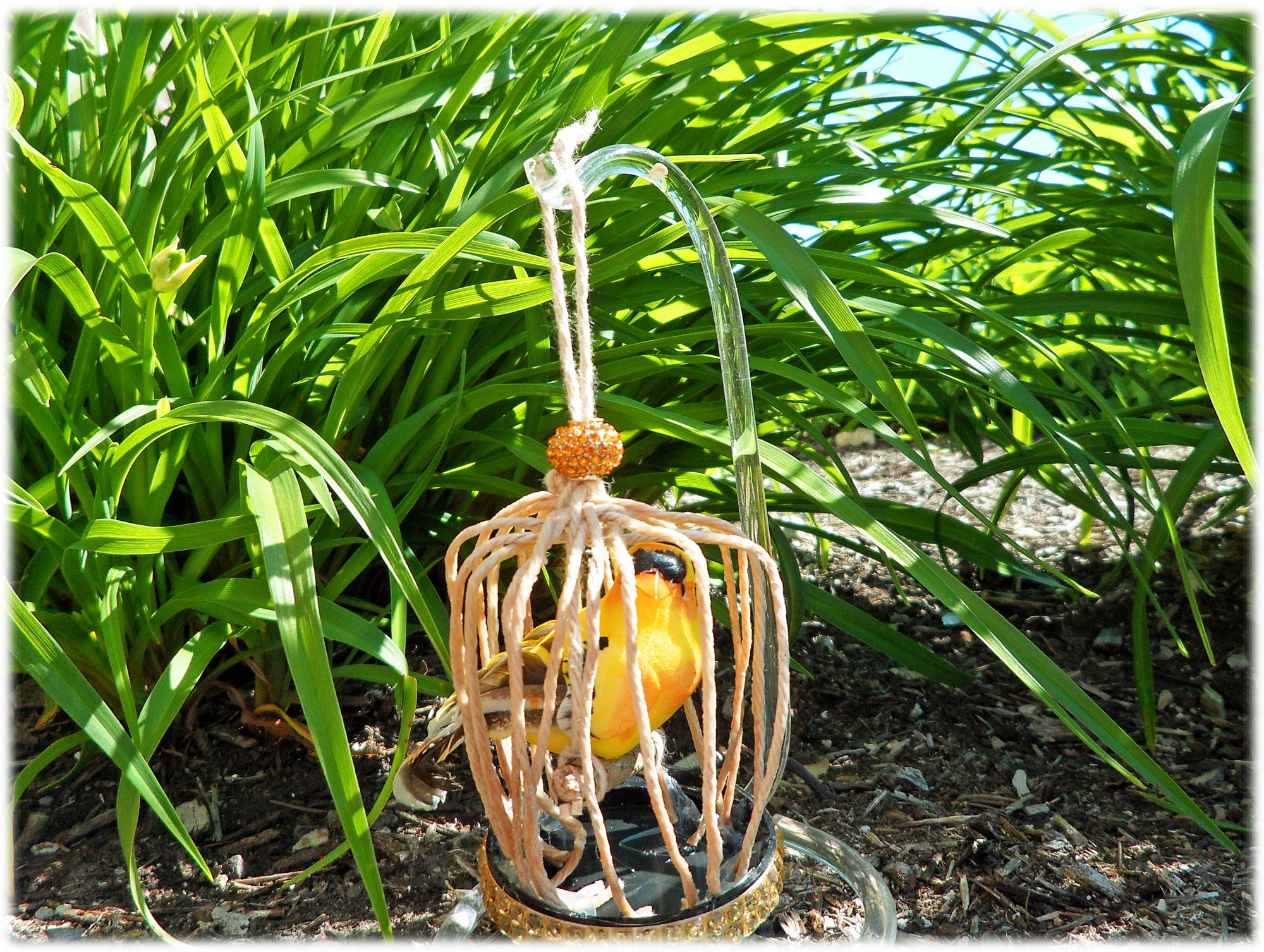 A tiny bird within a DIY bird cage as an ornament | OrnamentShop.com