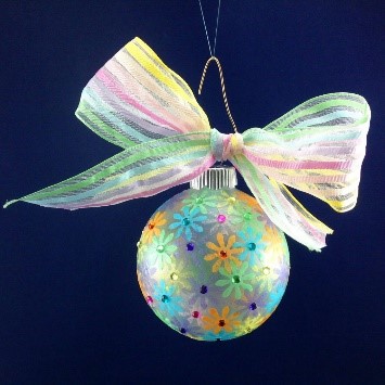A colorful ball ornament made of glass and paper mache | OrnamentShop.com