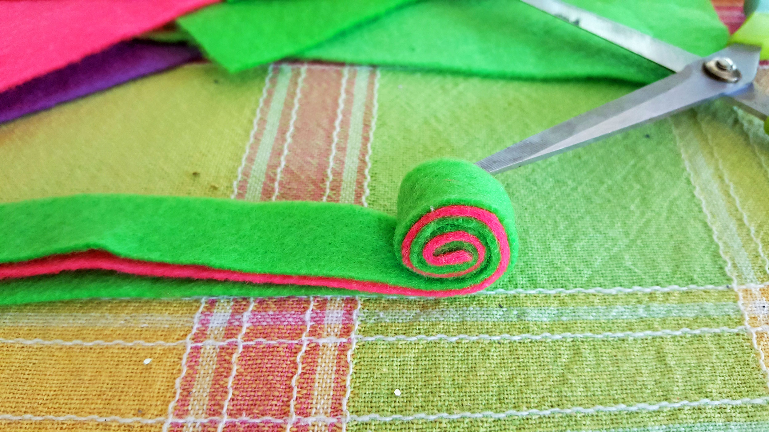 Step two is to roll your felt pieces together. | Ornamentshop.com