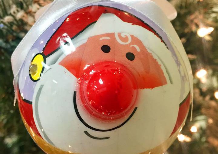 A Santa ornament with a big red glowing nose that lights up. | OrnamentShop.com