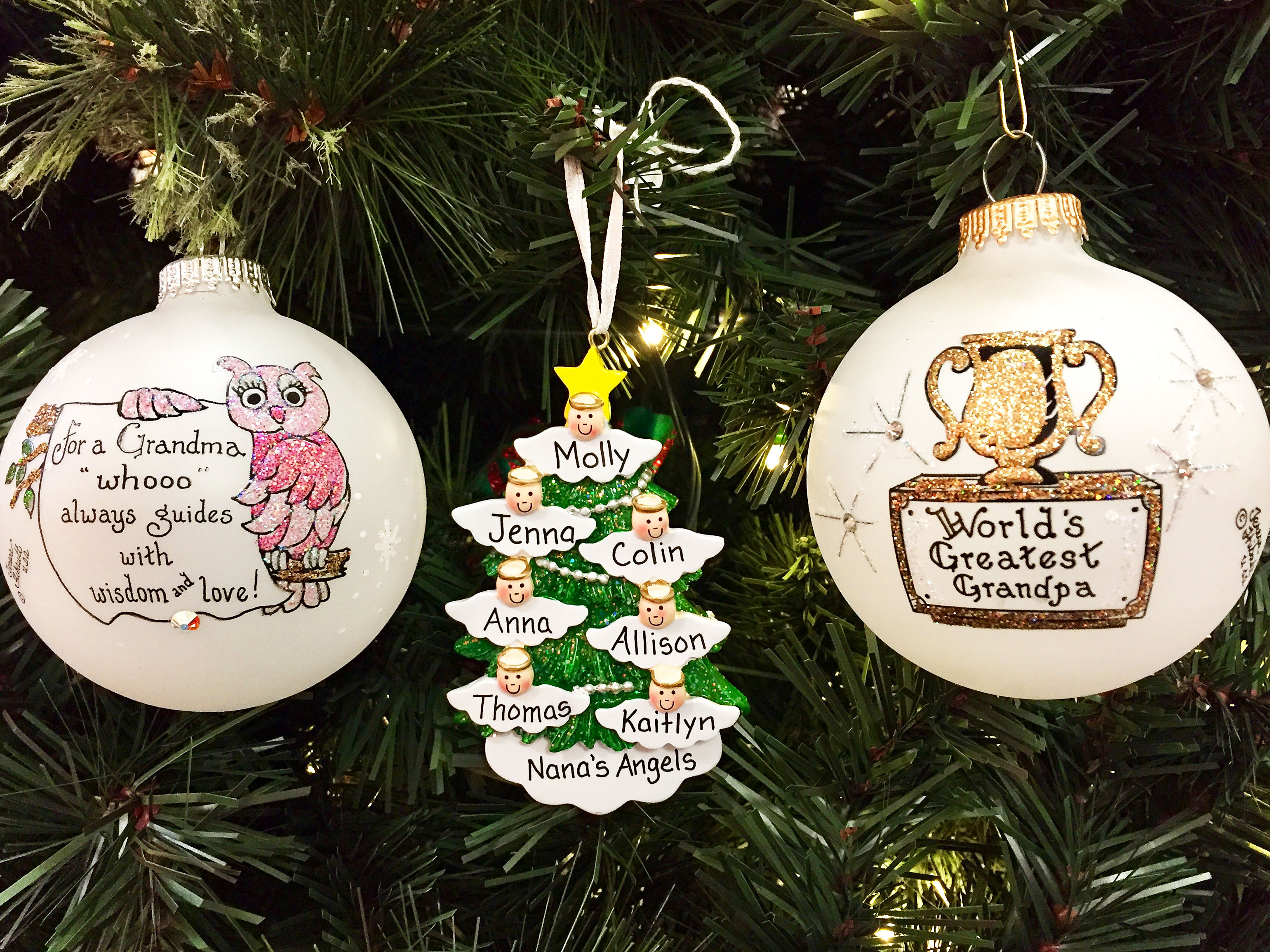 Three ornaments for grandparents. One has a wise owl for grandma and another has a trophy for world's best grandpa. | OrnamentShop.com