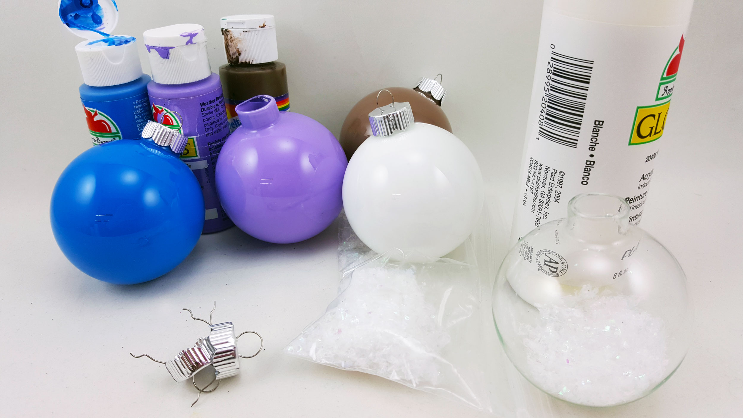 Step 1 is to coat the inside of the glass balls you are choosing with paint. | OrnamentShop.com