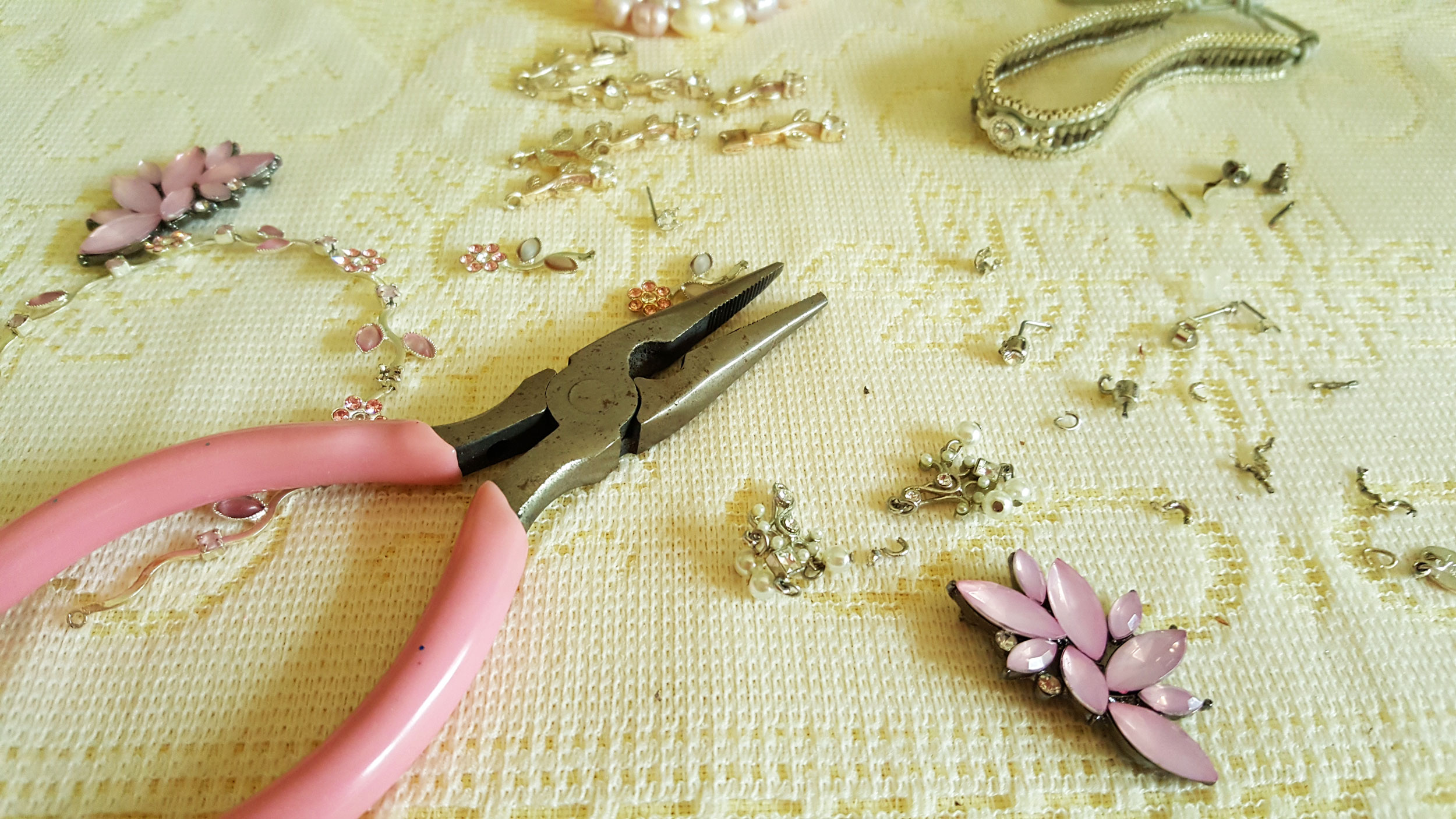 Step two is to remove the backs on any of your brooches, earings and pins so that they can be glued easily. | OrnamentShop.com