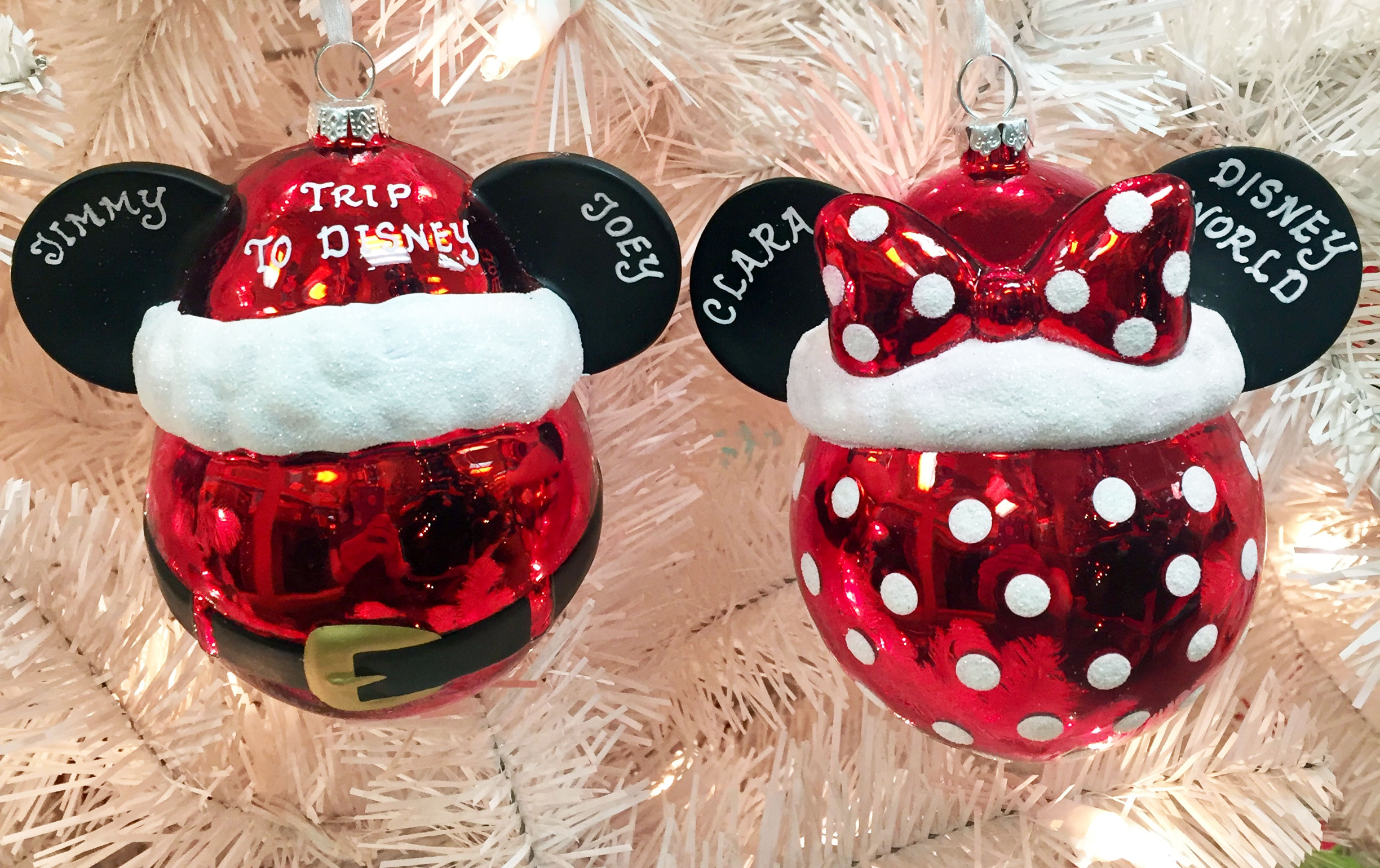 Two red and white Disney baulb ornaments with ears for Mikey and Minnie. | OrnamentShop.com