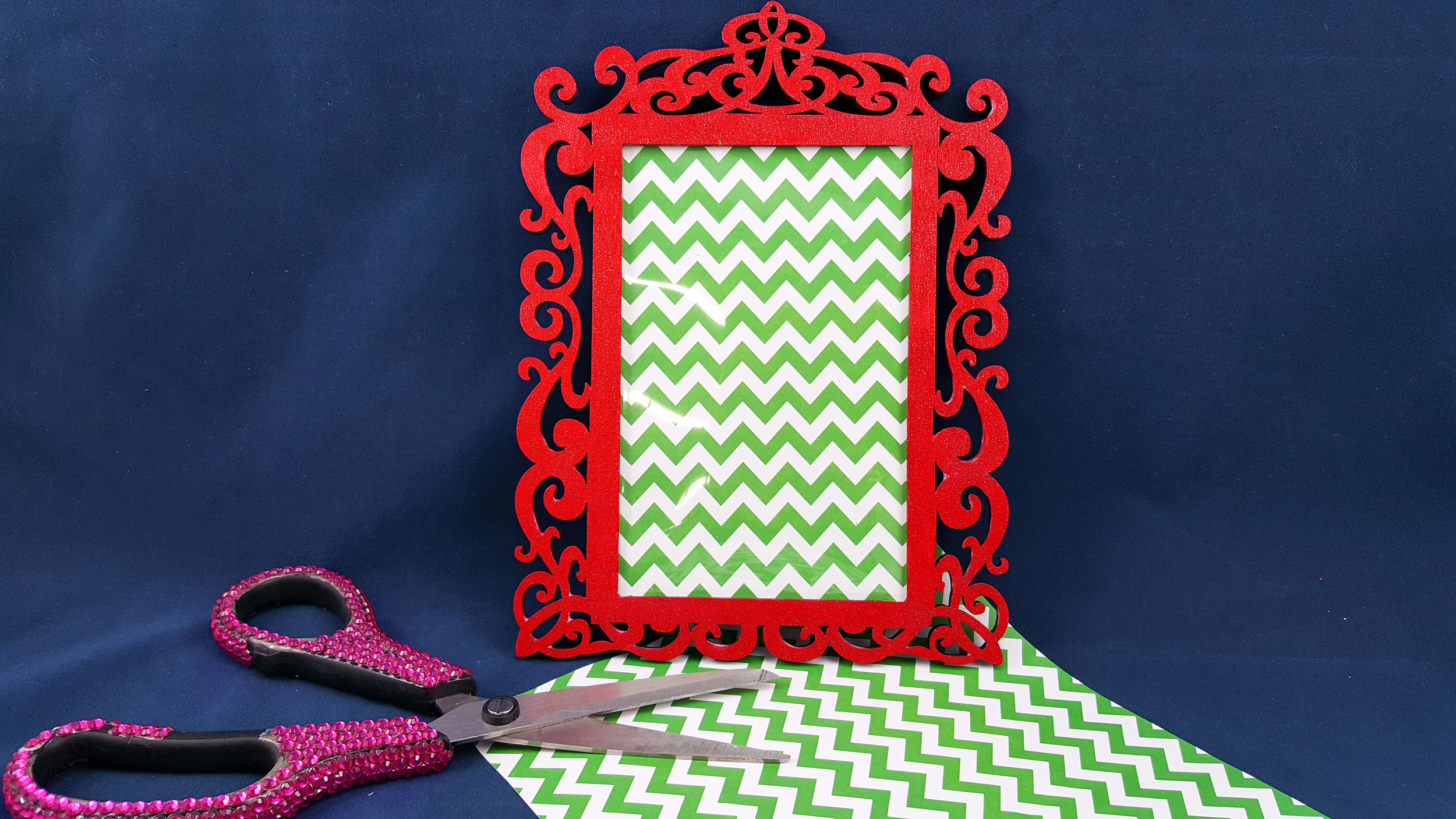 Step 3 is to insert colored scrapbook paper into the frame as a background. | OrnamentShop.com