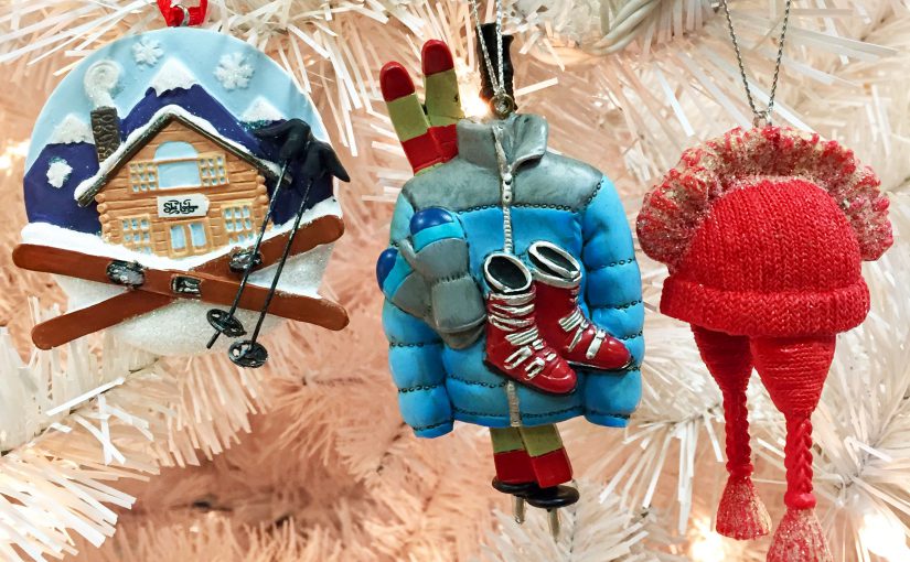 Three skiing ornaments including one for a ski lodge, one that has ski gear including a coat, scarf and boots, and a hat ornament that has a mohawk. | OrnamentShop.com