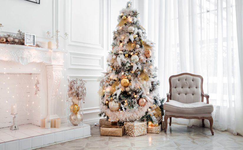 A white and gold Christmas tree theme including beautiful gold ornaments. | OrnamentShop.com