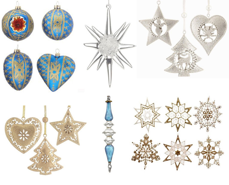 Gold, silver and blue glass ornaments are cut into star, snowflake icicle and other holiday symbols, and are perfect for decorating an elegant white Christmas tree. | OrnamentShop.com