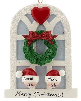 An ornament of a window or door with a green wreath made out of buttons in the center and two faces personalized underneath. | OrnamentShop.com