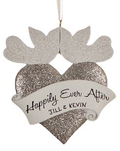 Two flat doves kiss at the top of a silver heart that reads Happily Ever After and a wedding date. | OrnamentShop.com