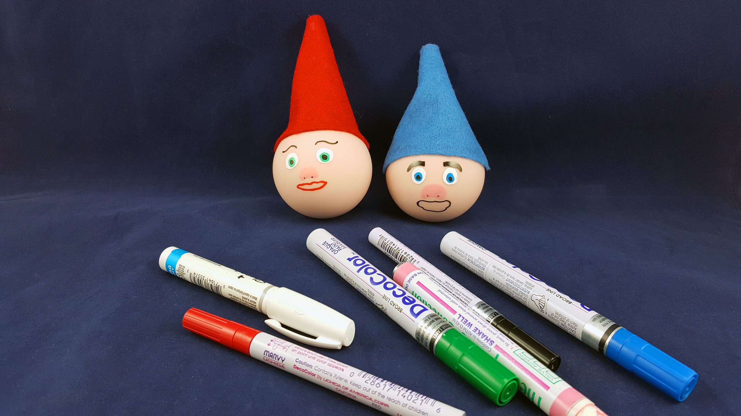 Draw the Gnomes faces using the paint markers and let them dry. | OrnamentShop.com