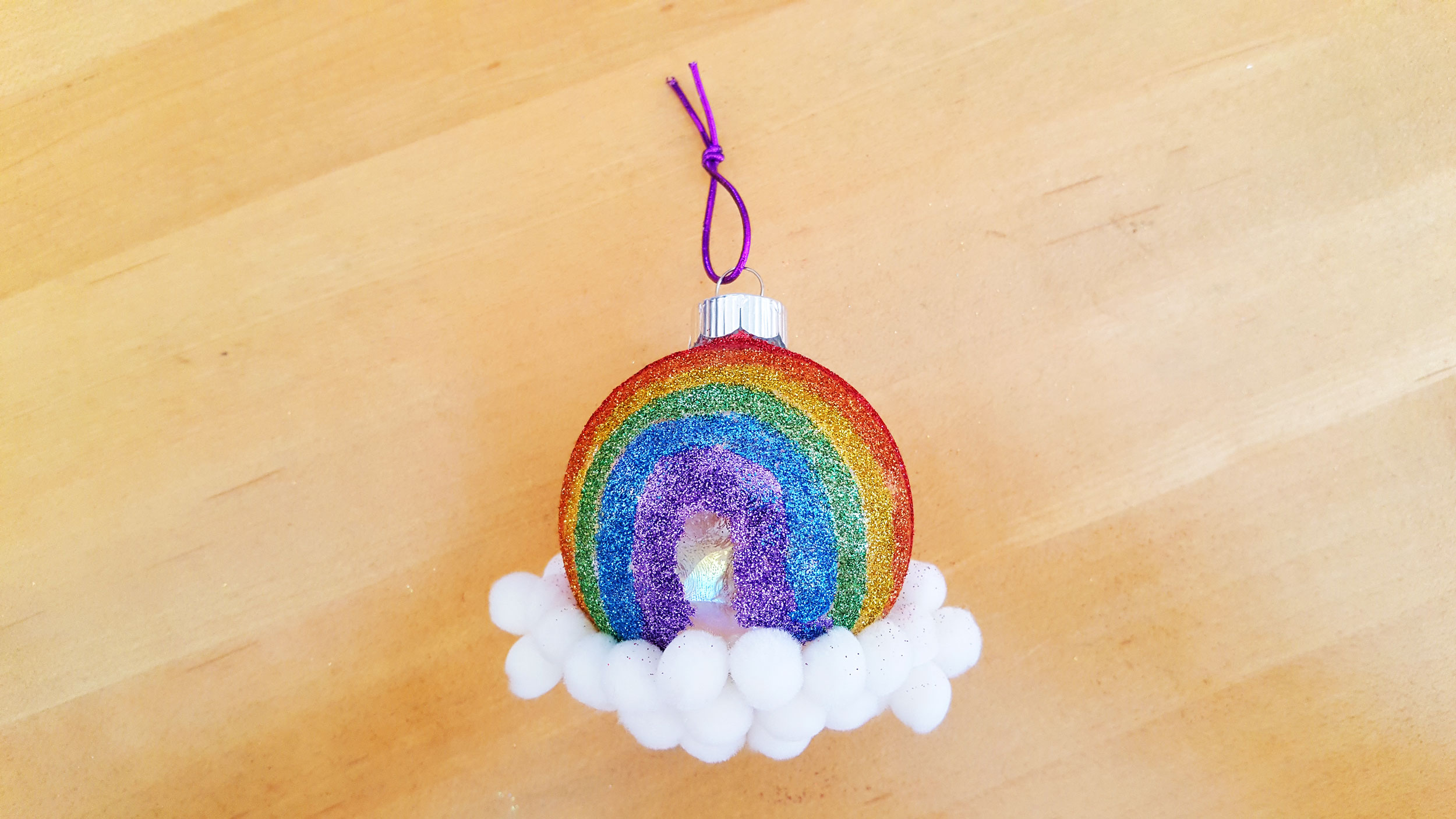  That’s it!  Now your have a colorful rainbow craft that you can hang in your home from a window or ornament stand. | OrnamentShop.com