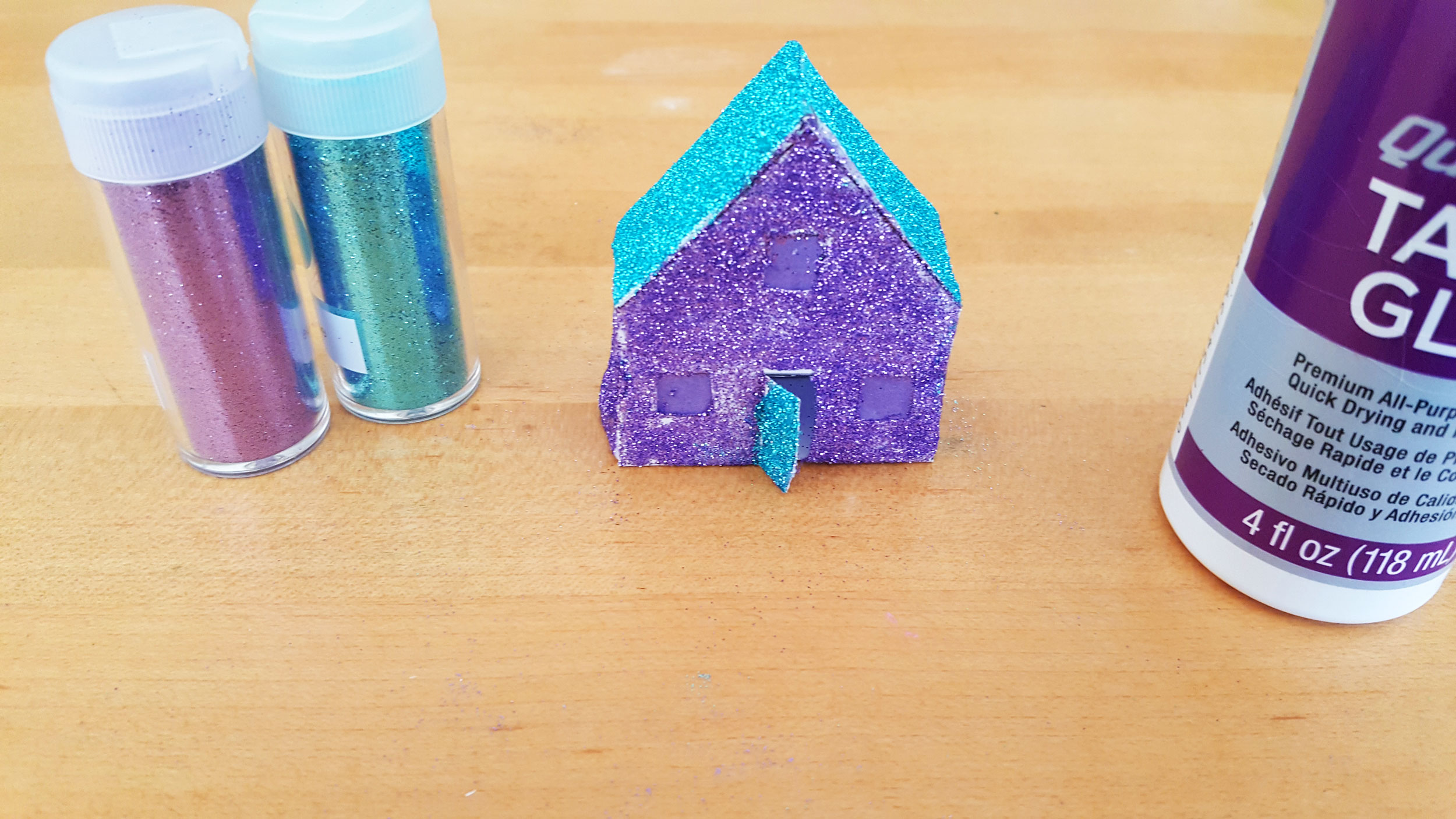 Add glue and glitters to outside of Paper House Ornament | OrnamentShop.com