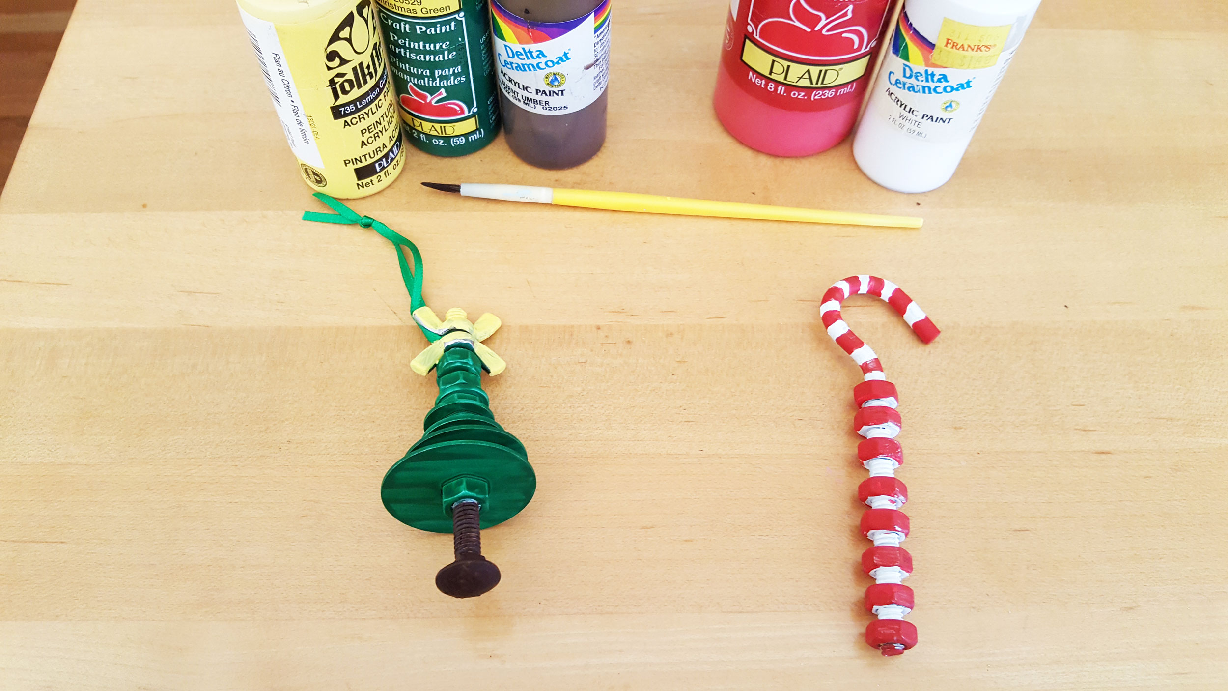 Father's Day candy cane Step 7 is to paint your ornament like a candy cane with white between the nuts and red on the nuts. | OrnamentShop.com
