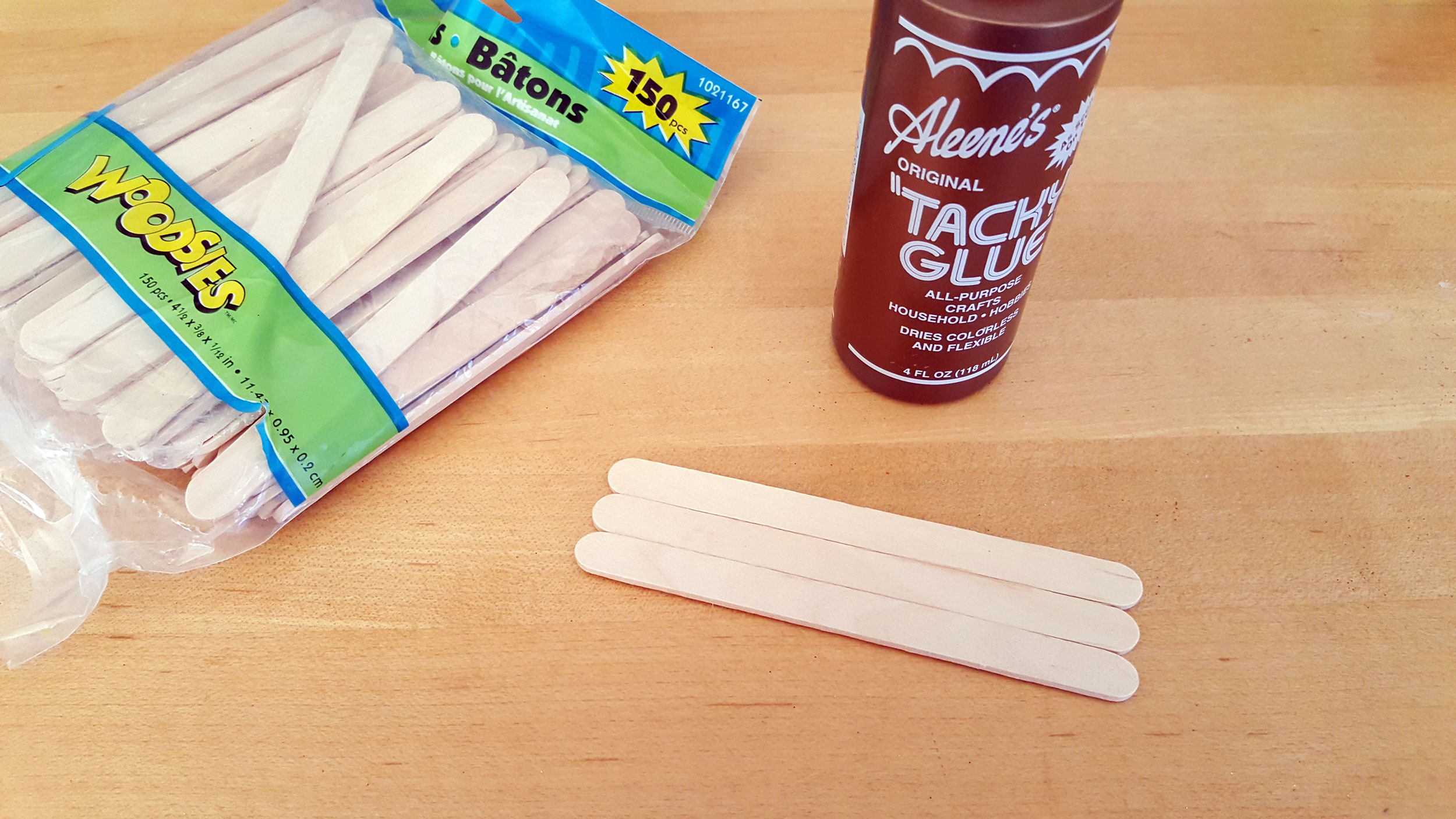 Step 1 is to glue three popsicle sticks together side by side and let them dry. | OrnamentShop.com
