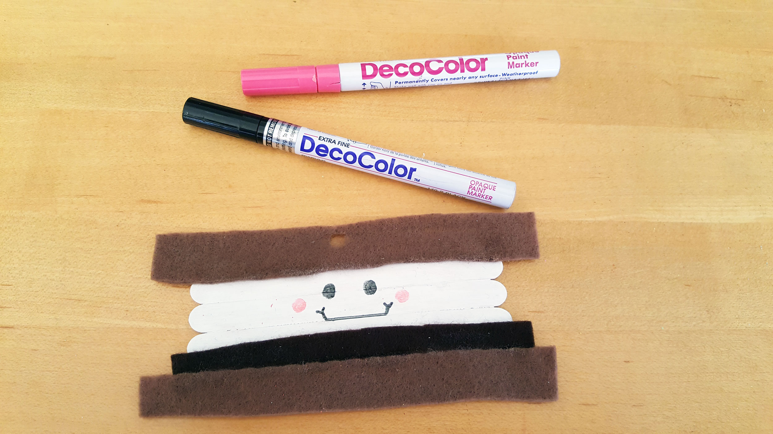 Step 6 is to use paint marker to draw your happy smiling face on the marshmallow. | OrnamentShop.com