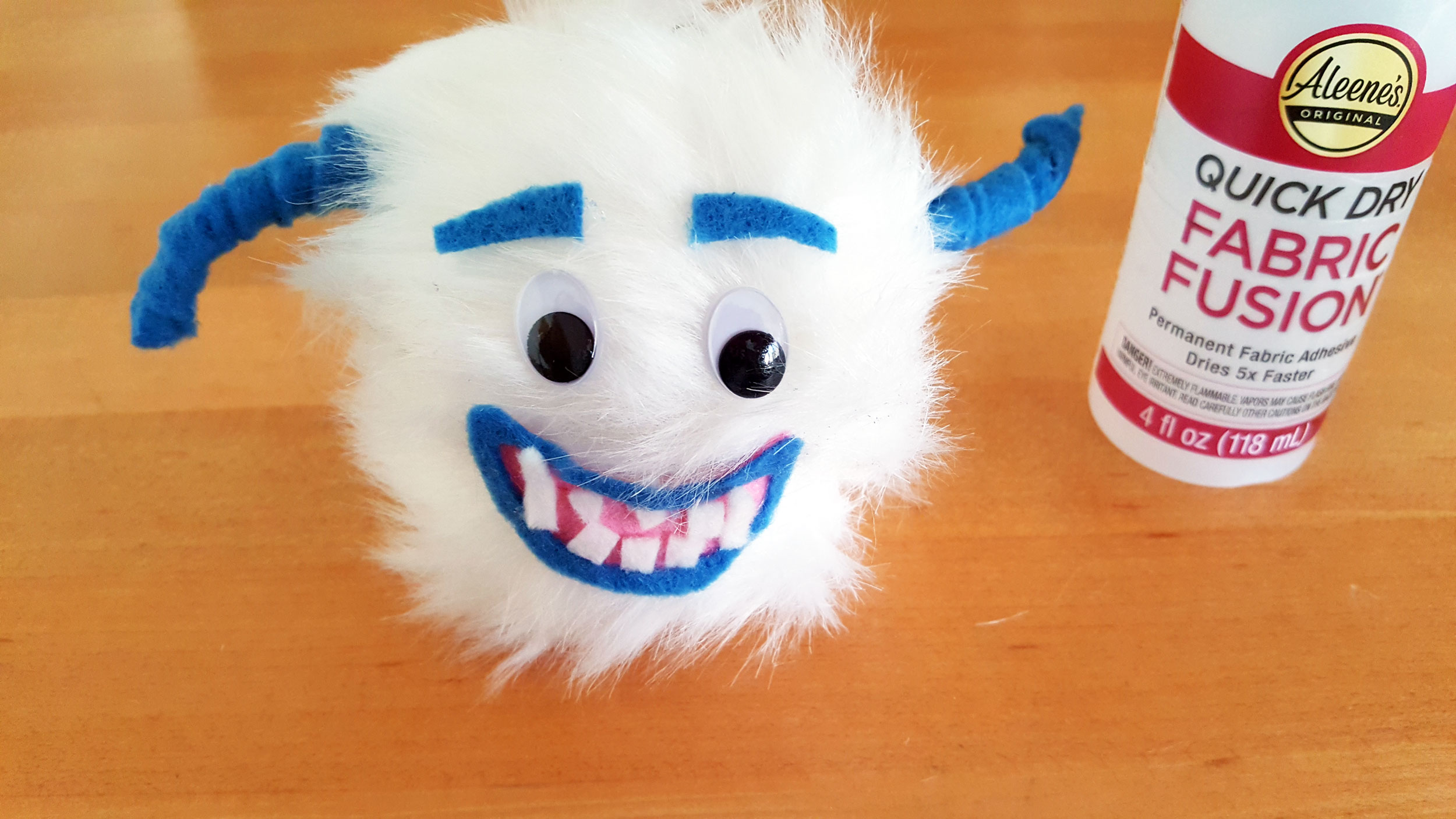 Smallfoot DIY Step 11 is to glue the mouth in place. | OrnamentShop.com