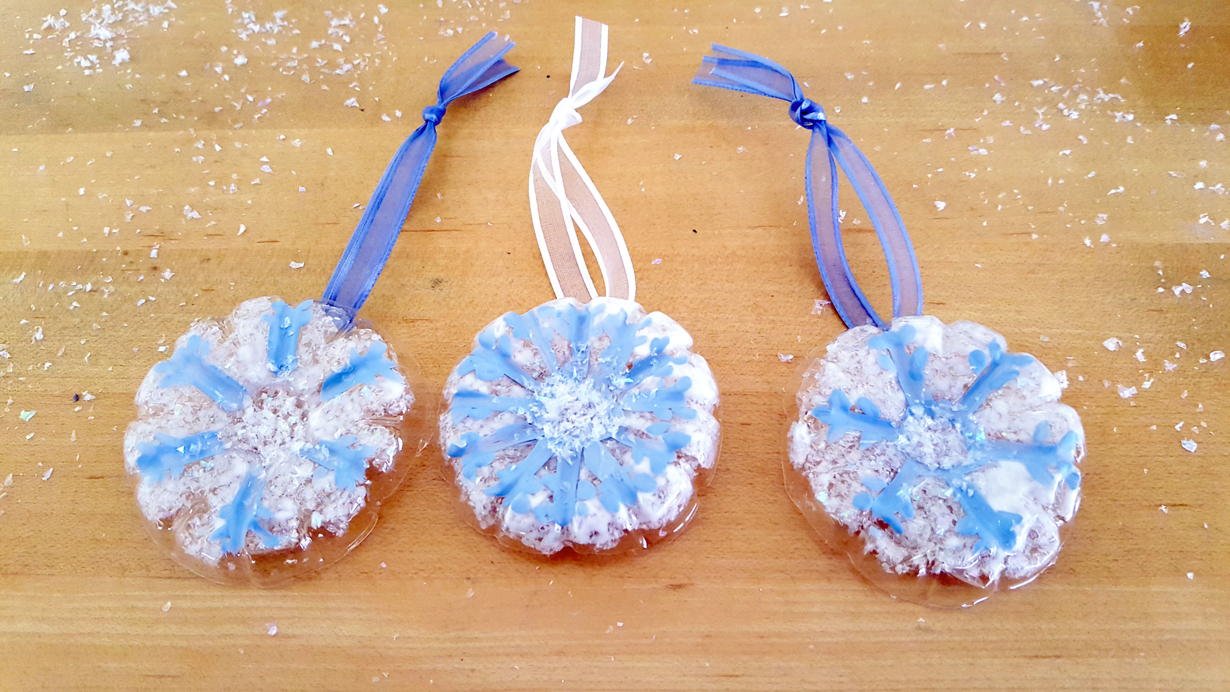 Finished Snowflake Ornaments on table. | OrnamentShop.com
