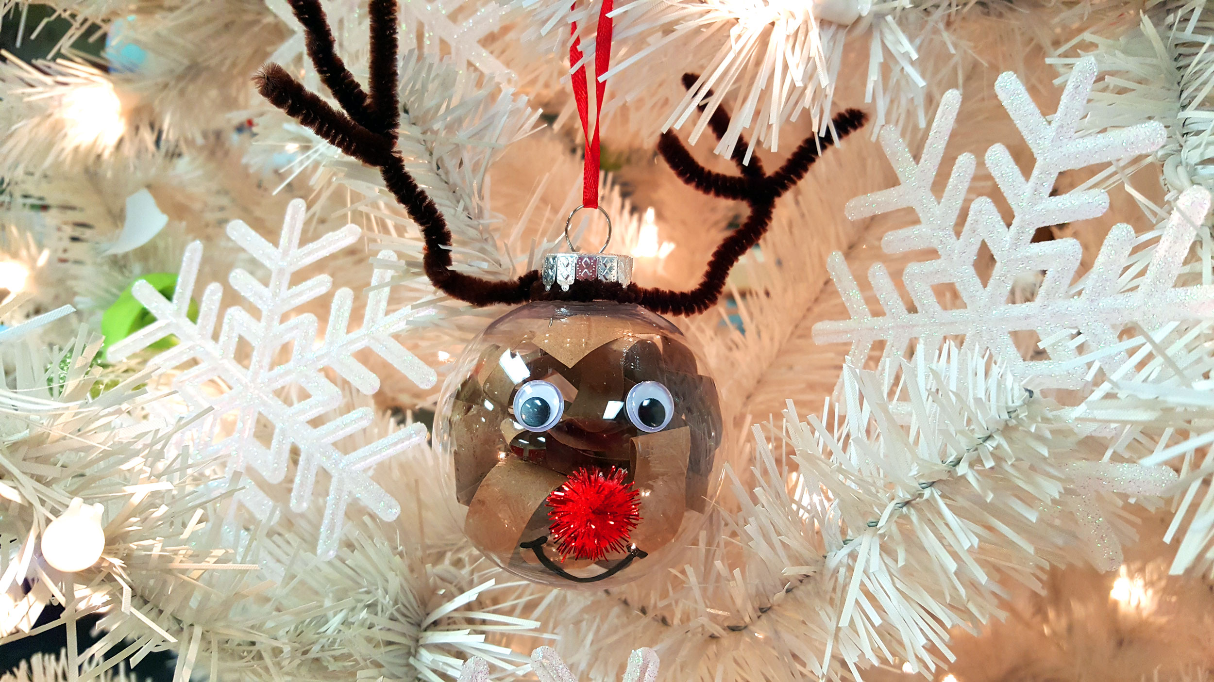 Completed Reindeer ornament hanging on a tree. | OrnamentShop.com