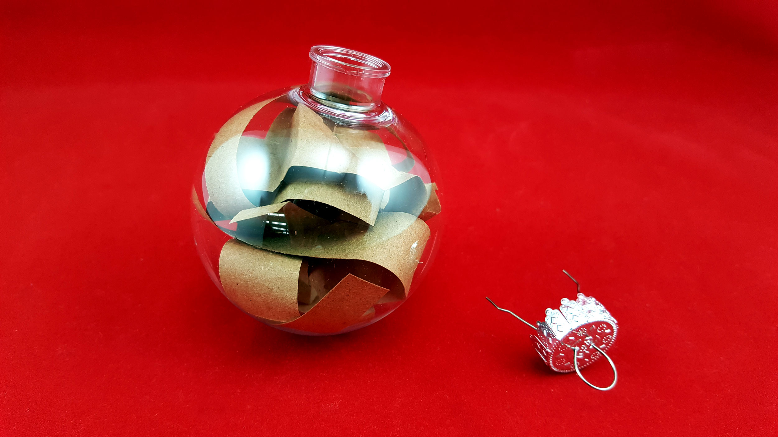 Reindeer ornament fill glass ball ornament with paper strips. | OrnamentShop.com