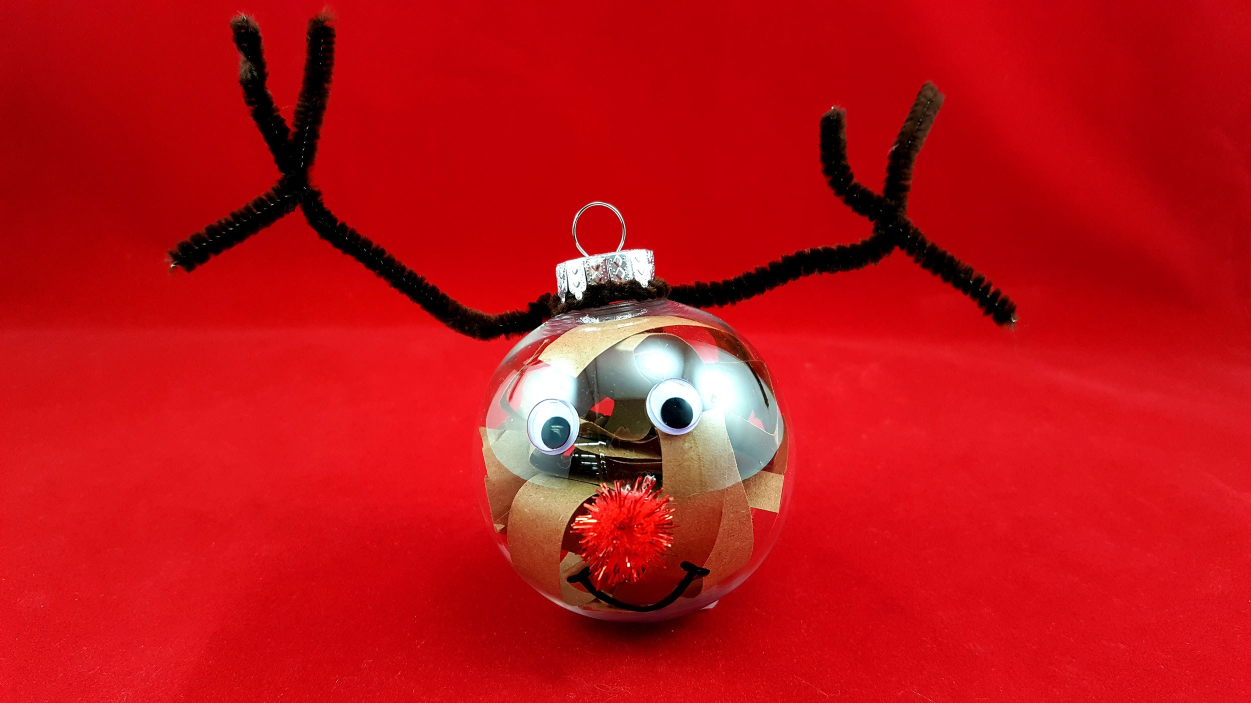 Reindeer ornament create antler with pipe cleaner pieces. | OrnamentShop.com