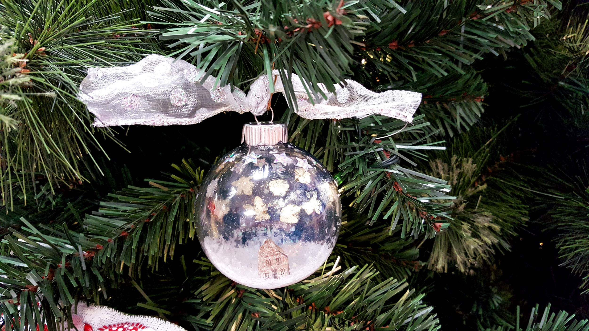 DIY Silent Night Ornament hanging on a tree. | OrnamentShop.com