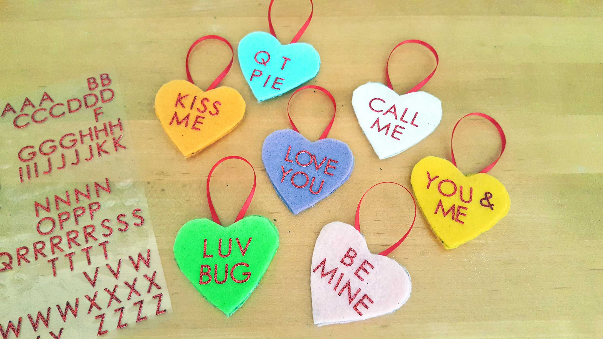 Valentine's Day ornaments DIY with Conversation Hearts step 4 is to add your alphabet letters for fun words. | OrnamentShop.com