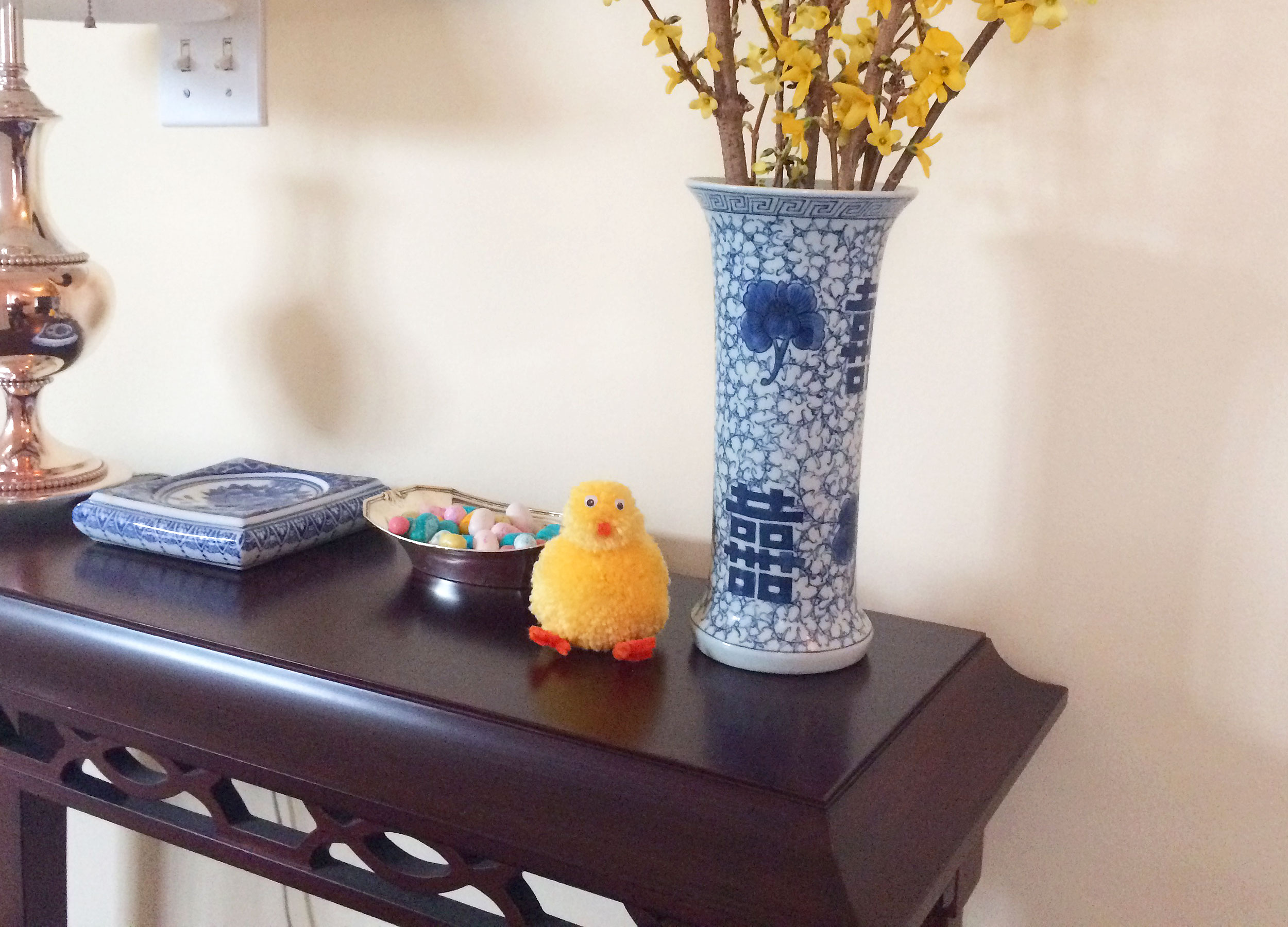 DIY Easter Chick decoration displayed on foyer console table. | OrnamentShop.com