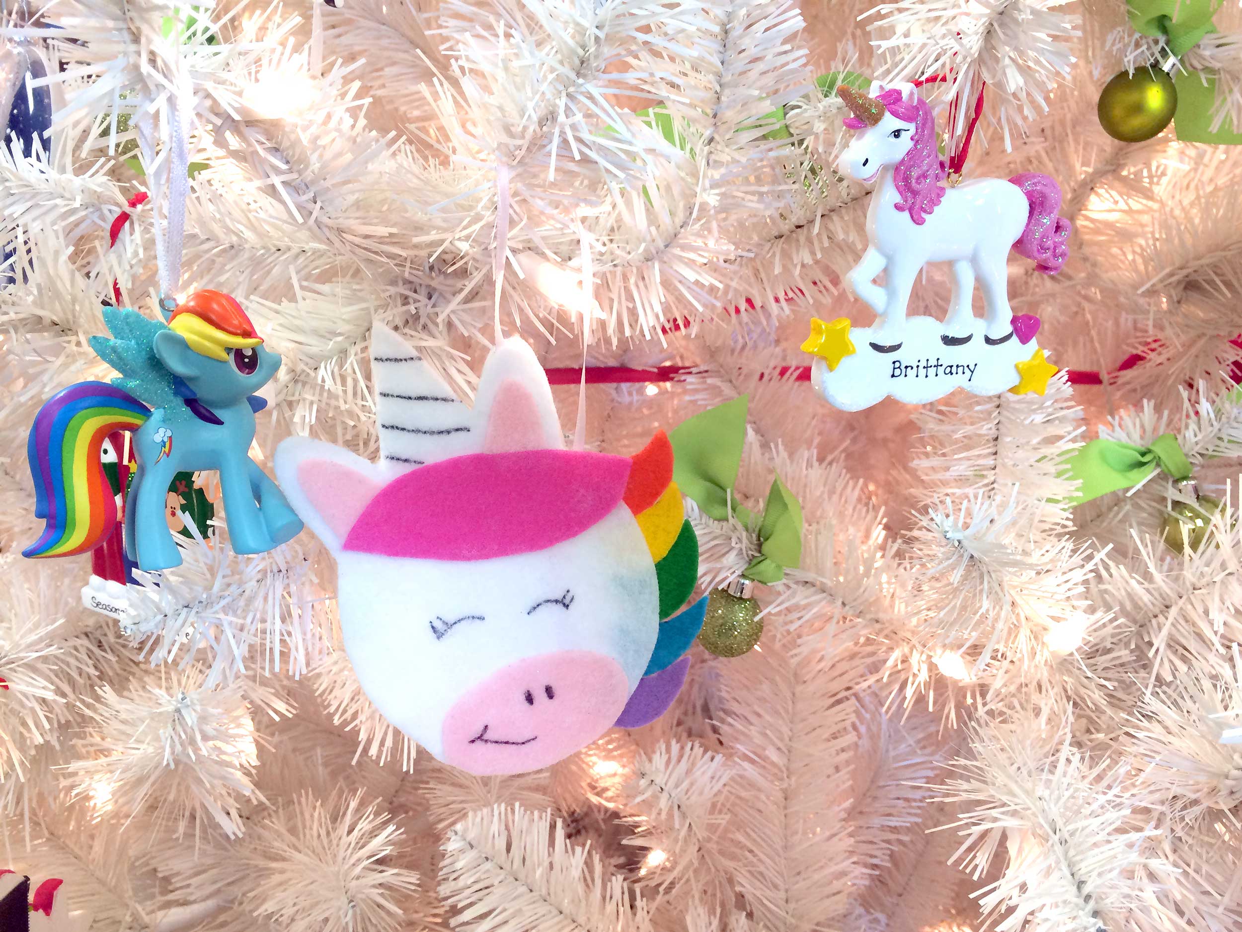 Unicorn ornaments hanging on Christmas tree | Ornament Shop