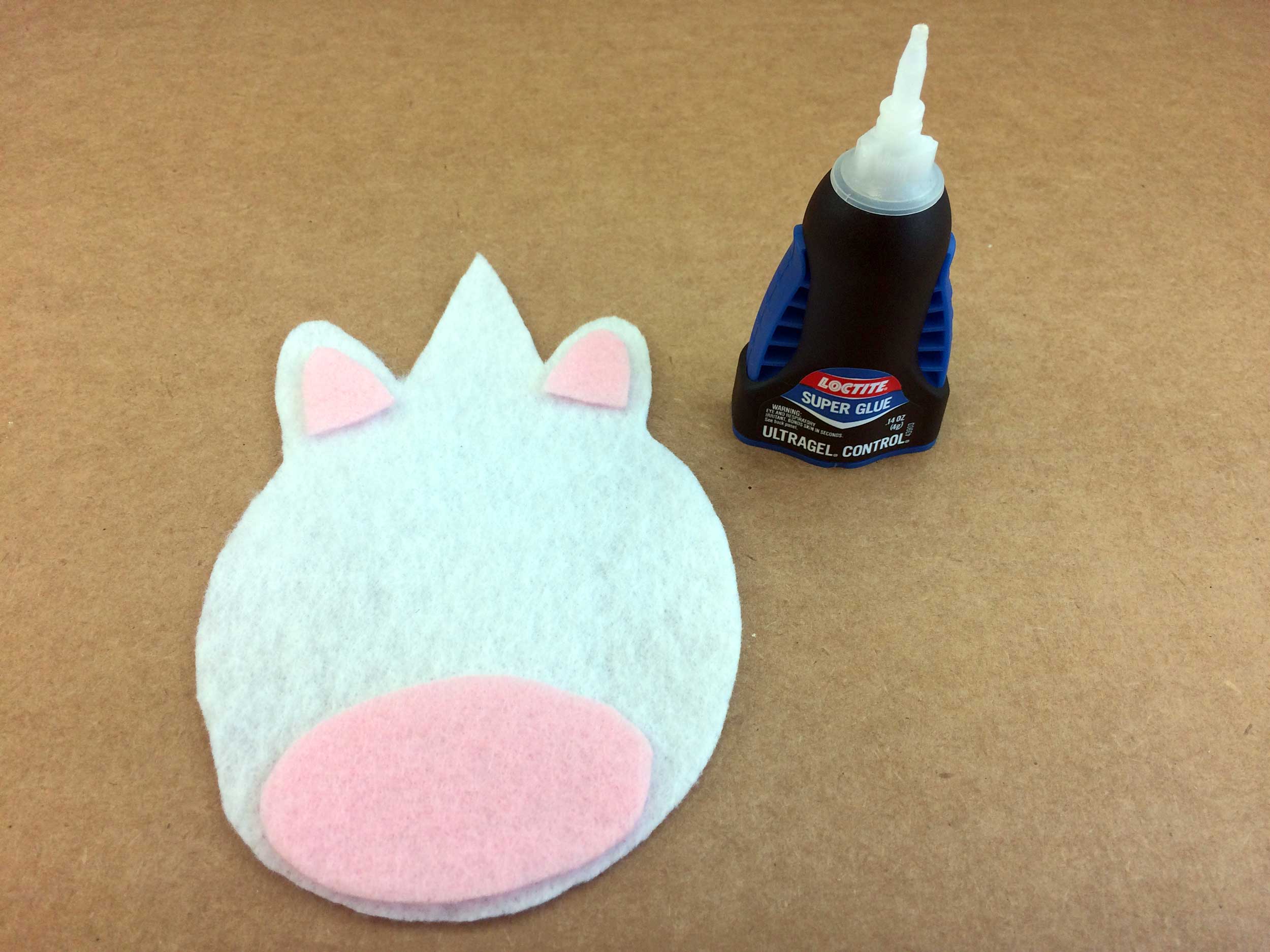 Glue ears and snout to head | Ornament Shop