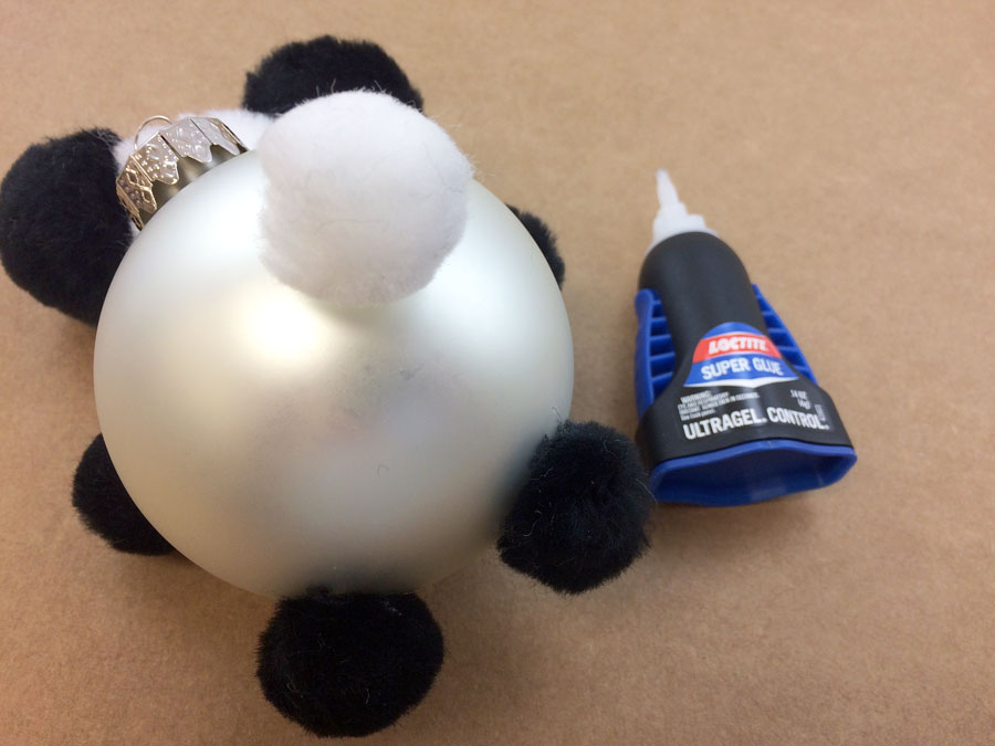 Glue white pom pom tail to back of Panda Ornament | OrnamentShop.com